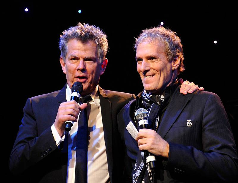 BEVERLY HILLS, CA - DECEMBER 09:  Producer David Foster (L) and singer Michael Bolton perform onstage during the launch of The Andrea Bocelli Foundation at the Beverly Hilton Hotel on December 9, 2011 in Beverly Hills, California.  (Photo by John Sciulli/Getty Images for Andrea Bocelli Foundation)