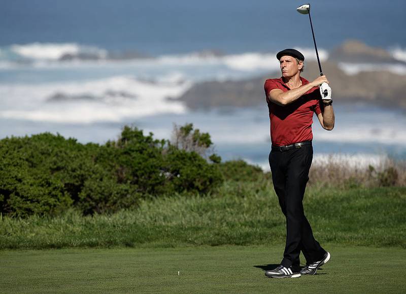 PEBBLE BEACH, CA - FEBRUARY 14:   Musician Michael Bolton hits a shot during the third round of the AT&T Pebble Beach National Pro-Am at the Monterey Peninsula Country Club on February 14, 2015 in Pebble Beach, California.  (Photo by Harry How/Getty Images)