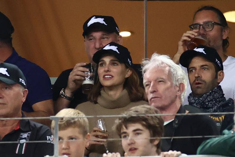SYDNEY, AUSTRALIA - MARCH 26:  Actress Natalie Portman with her husband Benjamin Millepied watch the round three NRL match between the South Sydney Rabbitohs and the Sydney Roosters at Stadium Australia on March 26, 2021, in Sydney, Australia. (Photo by Cameron Spencer/Getty Images)