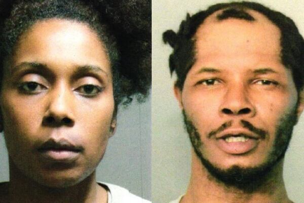Suspects arrested after officials find body that was set on fire