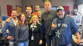 Dallas Cowboys Legend Troy Aikman Stops By 103.3 The Eagle To Talk With Lynn Hernandez