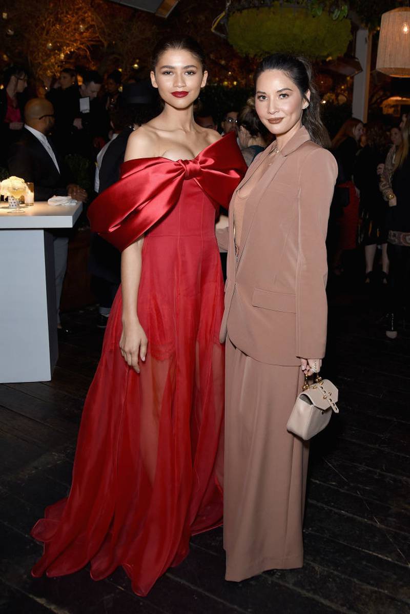LOS ANGELES, CA - FEBRUARY 21: Zendaya (L), Olivia Munn, Vanity Fair x Lancôme Paris With Belvedere Vodka Raise A Glass To Toast Women In Hollywood on February 21, 2019 in Los Angeles, California.  (Photo by Presley Ann/Getty Images for Belvedere Vodka)