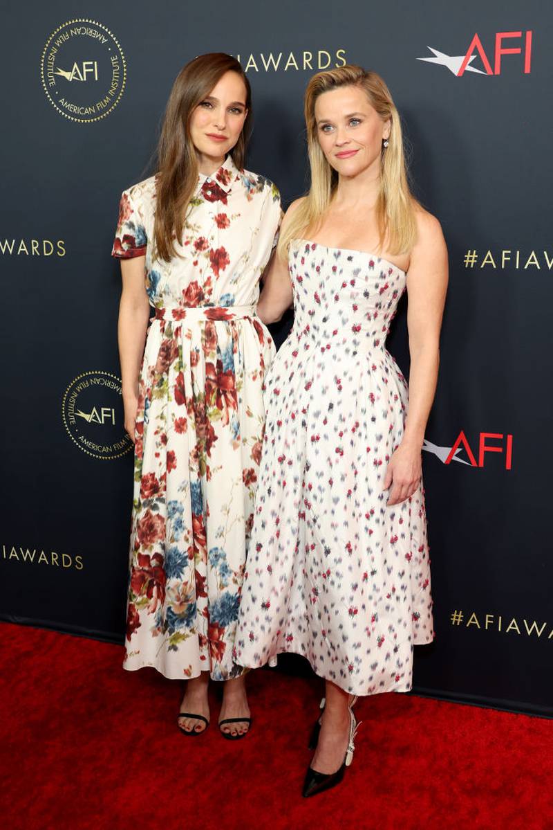 LOS ANGELES, CALIFORNIA - JANUARY 12: (L-R) Natalie Portman and Reese Witherspoon attend the AFI Awards Luncheon at Four Seasons Hotel Los Angeles at Beverly Hills on January 12, 2024 in Los Angeles, California. (Photo by Monica Schipper/Getty Images)