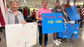 Photos: Honor Flight veterans welcomed back to Tulsa