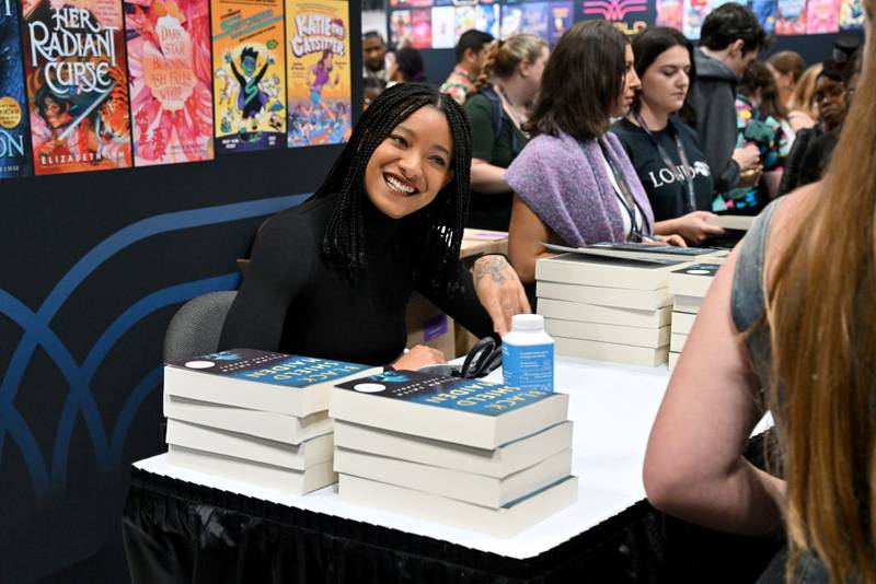 NEW YORK, NEW YORK - OCTOBER 14: Willow Smith signs autographs during New York Comic Con 2023 - Day 3 at Javits Center on October 14, 2023 in New York City. (Photo by Bryan Bedder/Getty Images for ReedPop)